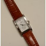 A Longines ladies wristwatch, with subsidiary seconds dial and tan leather Longines bracelet strap,