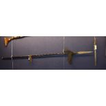 An African spear, with stained bamboo grip, 224cm long,