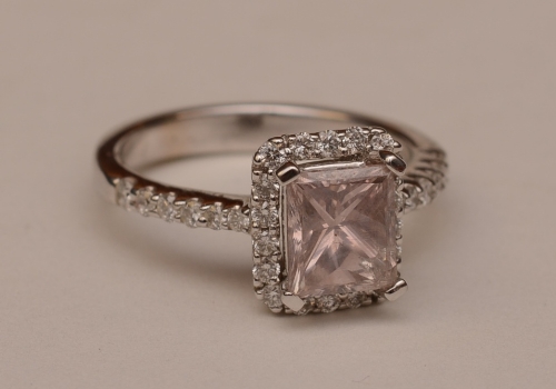 An 18ct white gold pale pink topaz and diamond ring,