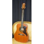 An Eko acoustic six string guitar,