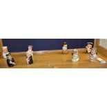 Eight small Royal Doulton character toby jugs, seven from the Doultonville collection,