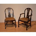 A set of eight mahogany Hepplewhite style dining chairs, with serpentine seats,