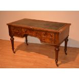 A 19th century walnut kneehole desk, with later tooled inset to the top, above single drawer,