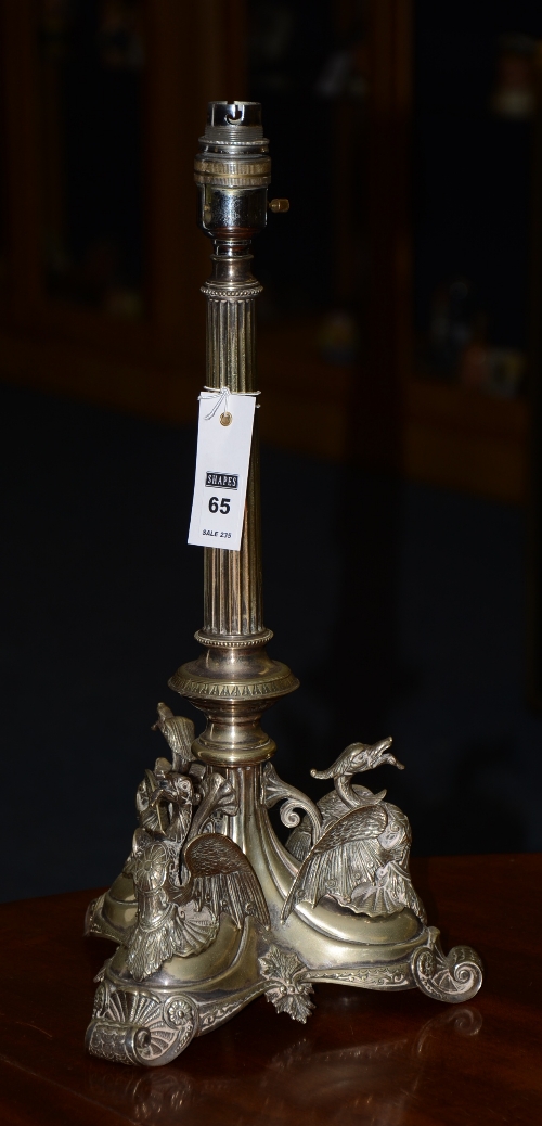 A Victorian plated candlestick converted to table lamp,