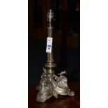 A Victorian plated candlestick converted to table lamp,