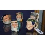 Five small Royal Doulton character jugs, comprising of Don Quixote, Robinson Crusoe, Bacchus,