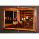 A Victorian marquetry inlaid wall mirror,