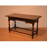 A late 19th/early 20th century Jacobean style oak side table, with rectangular plank top,