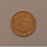 An 1887 French 20 francs gold coin, 6.