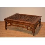 A Chinese hardwood coffee table, of rectangular form,