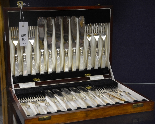 A set of twelve mother of pearl handled Epns fish knives and forks,