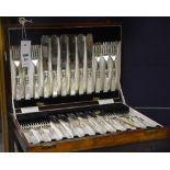 A set of twelve mother of pearl handled Epns fish knives and forks,