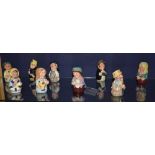Nine small Royal Doulton character toby jugs from the Doultonville collection,