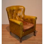 A vintage tan leather buttonback club armchair, with later velour covered seat,