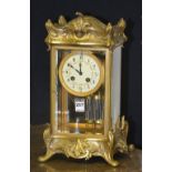 A late 19th/early 20th century French four glass mantel clock,