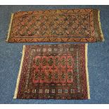 Two Persian prayer mats, both decorated with gulls and motifs, on orange and red grounds,