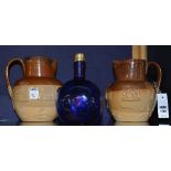 Two Doulton Lambeth relief moulded pottery jugs, 18 & 19cm high,