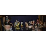 A mixed lot of toby character jugs, to include Beswick character tea pot of 'Peggotty',