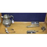 A small mixed lot of plated wares, to include embossed water jug, Indian scroll holder,