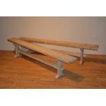 A pair of pine refectory benches,