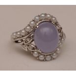 An 18ct white gold jade, pearl and diamond ring,