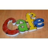 A cafe shop sign, painted in red, green, yellow and blue, 28cm high x 53.