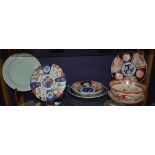 A mixed lot of Chinese and Japanese pottery plates, to include imari, celadon,