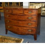 A George III mahogany bow front chest of drawers,