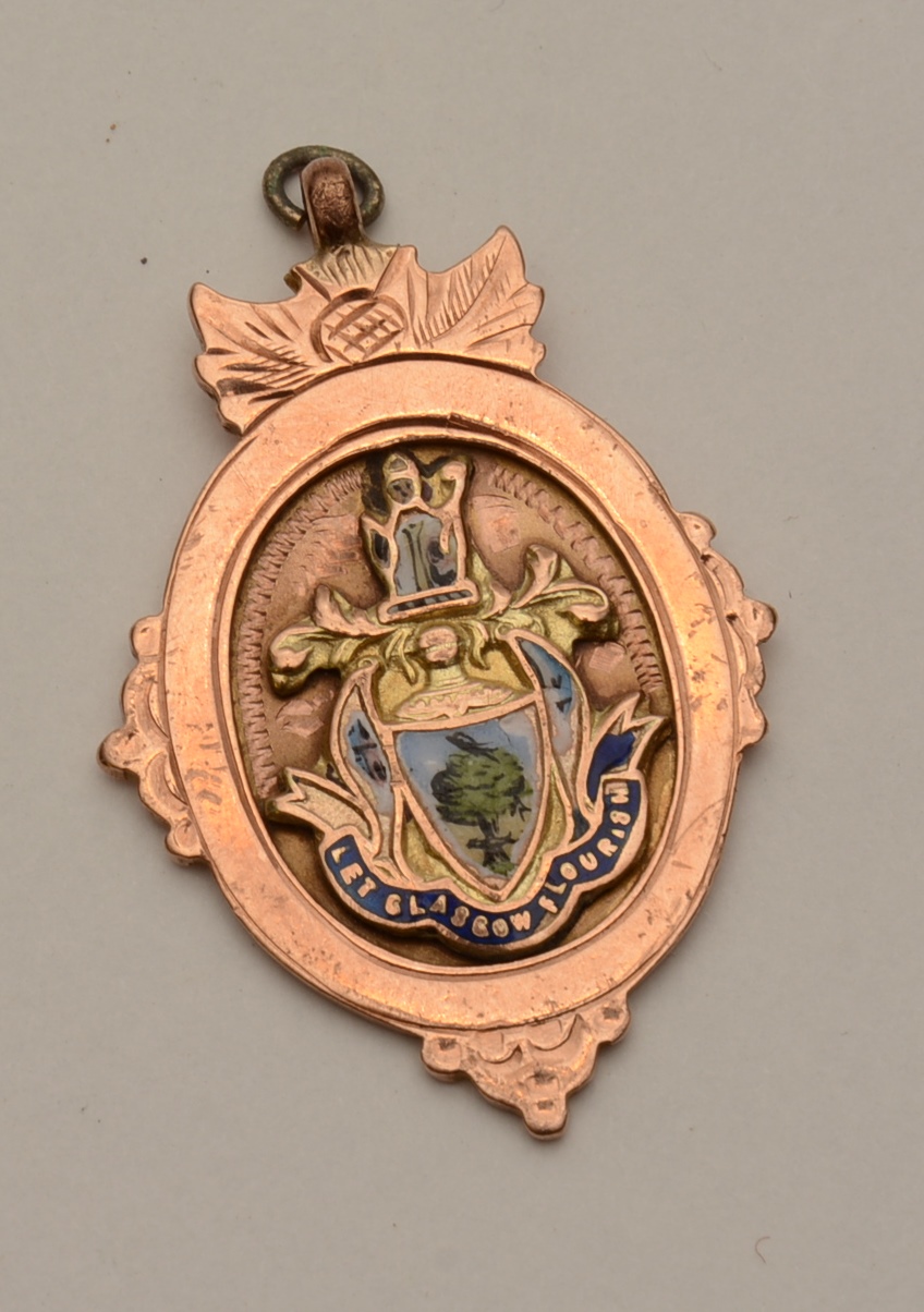 A 9ct gold and enamel medal featuring the Glasgow Coat of Arms, circa late 19th/early 20th century,