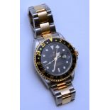 An 18ct gold and stainless steel gentleman's Rolex Oyster Perpetual Date GMT Master II Superlative