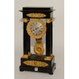 An 18th century French ebonised and ormolu Portico clock signed Leroy A Paris,