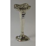 A silver posy vase, with pierced foliate top over tapering column and circular foot,