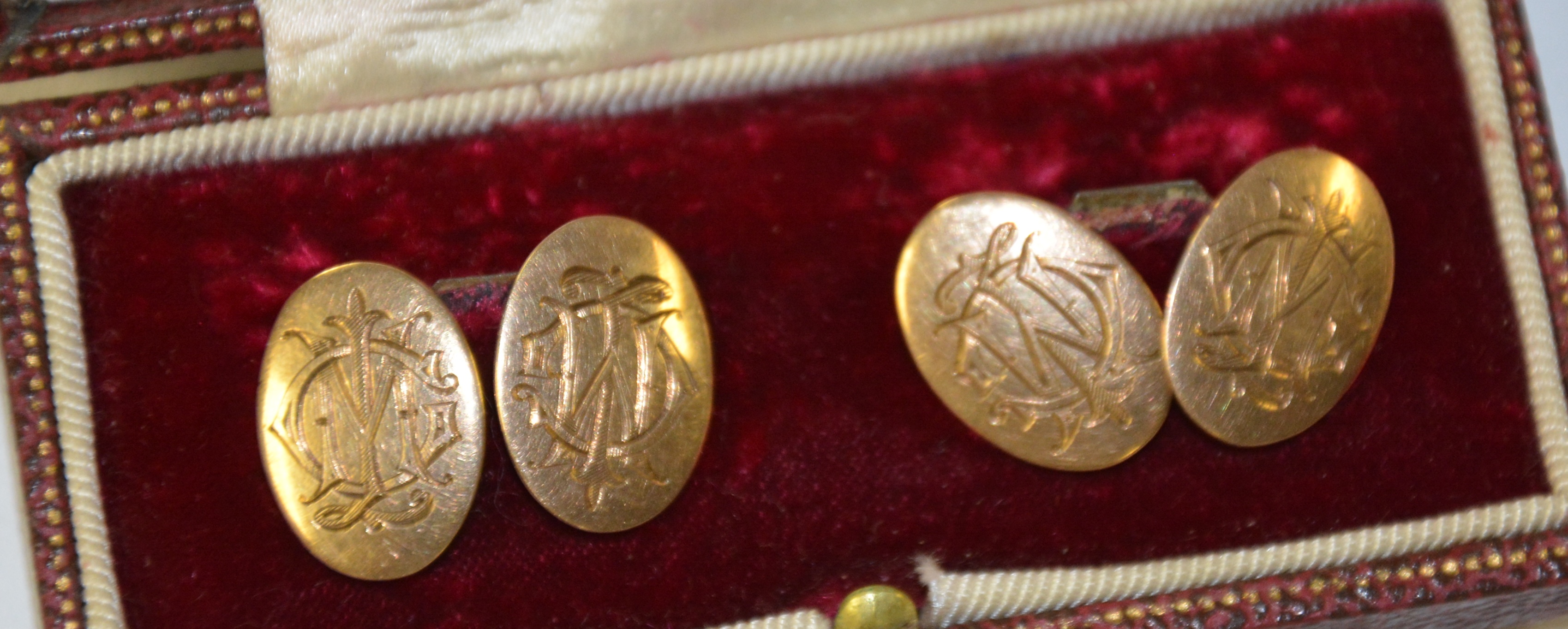 A pair of 9ct gold cufflinks, initialled MJC, stamped 375 to reverse,