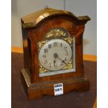 A late 19th/early 20th century walnut Black Forest mantel clock,