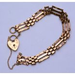 A 9ct gold padlock bracelet, stamped 375, 8.