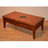 A modern coffee table, decorated with diamond lozenge to the top, with two small drawers,