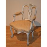 A Victorian French style painted armchair,