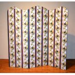 A three section folding dressing screen, upholstered with Chinese themed panels of figures,