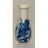 A Chinese blue and white spill vase, decorated with panel of birds in foliage, reign marks to base,