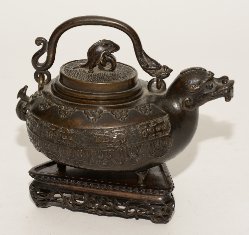 A Chinese bronze animal form wine vessel in the archaic style Qing dynasty,