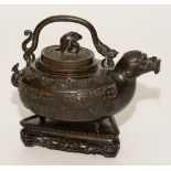 A Chinese bronze animal form wine vessel in the archaic style Qing dynasty,