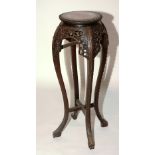 A 19th century Chinese Hongmu carved jardiniere stand, with marble top,