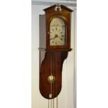 A rare George III mahogany eight day hooded wall clock with alarm by Andrew Rich,