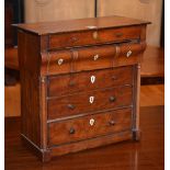 A Victorian mahogany apprentice piece of a Scottish chest of drawers, in two sections,