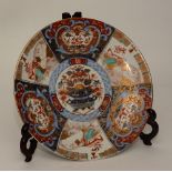 A late 19th century Japanese Imari and Kutani porcelain charger from the Meiji Period,