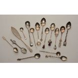 A collection of silver and white metal teaspoons, 11 stamped with hallmarks,
