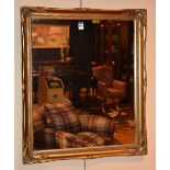 A modern gilt framed wall mirror,