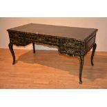 A large faux marble desk by John Widdicomb & Co,