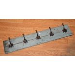 A vintage painted wall mounting hat & coat rack, GNER plaque to back of the five metal hooks,