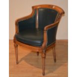 A French style leather upholstered desk armchair, with studded decoration,